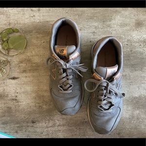Women’s Gray and Rose Gold New Balance 574 Sneakers